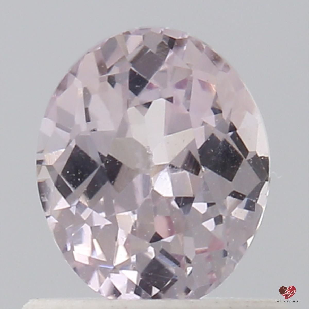 0.85cts Oval Icy Blush Champagne Sapphire