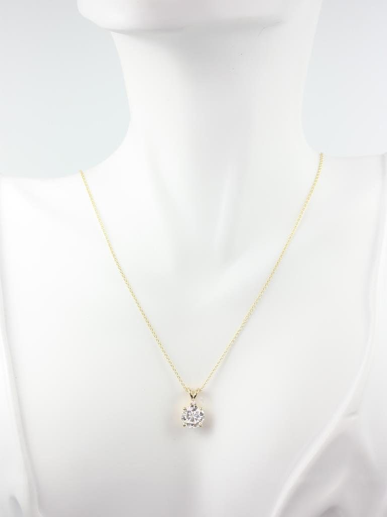 Rosados Box Nicole 14kt Gold Round Moissanite and Diamond Solitaire Leaf Gallery Basket Necklace