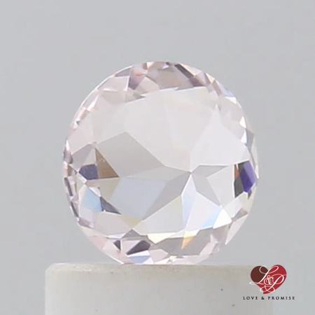 0.61cts Round Icy Peachy Blush Champagne Sapphire