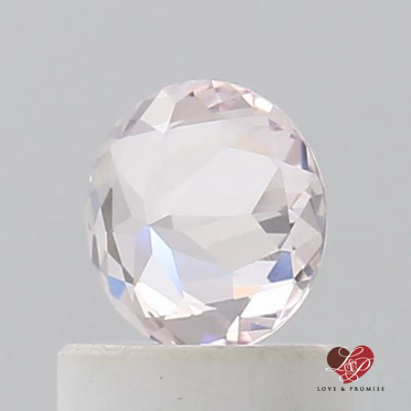 0.61cts Round Icy Peachy Blush Champagne Sapphire