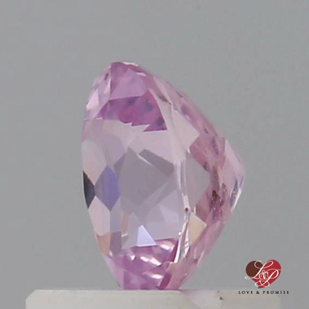 0.73cts Oval Medium Rustic Rose Champagne Sapphire