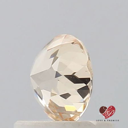 0.73cts Round Butter Peach Champagne Sapphire
