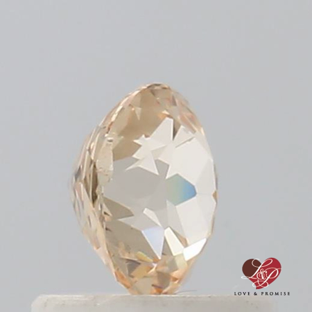 0.73cts Round Butter Peach Champagne Sapphire