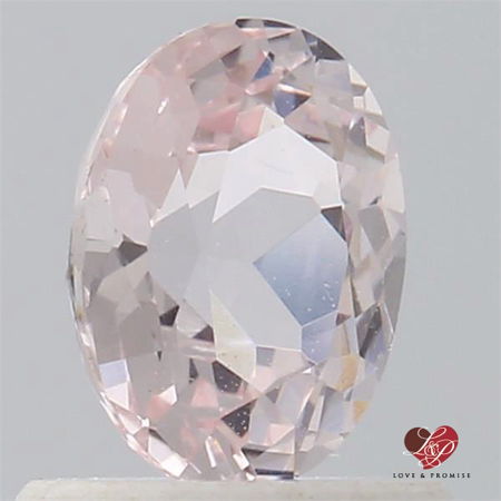 0.91cts Oval Icy Peachy Pink Champagne Sapphire