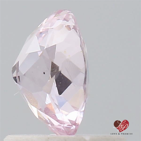 0.92cts Oval Peachy Pink Champagne Sapphire