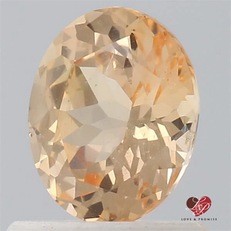 0.92cts Oval Peach Champagne Sapphire