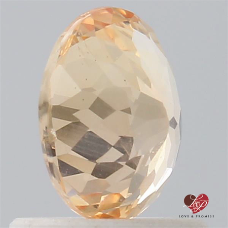 0.92cts Oval Peach Champagne Sapphire