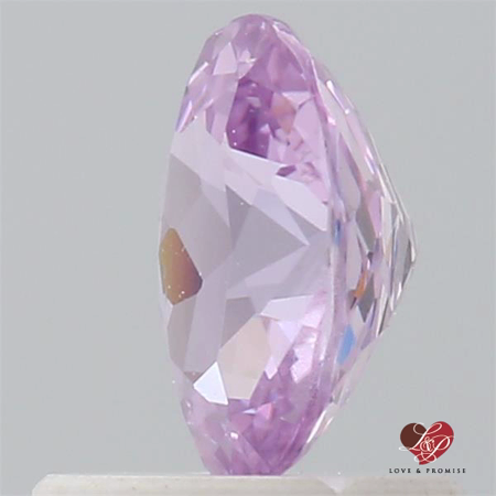 0.95cts Oval Blush Champagne Sapphire