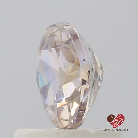 0.95cts Round Peachy Pink Champagne Sapphire