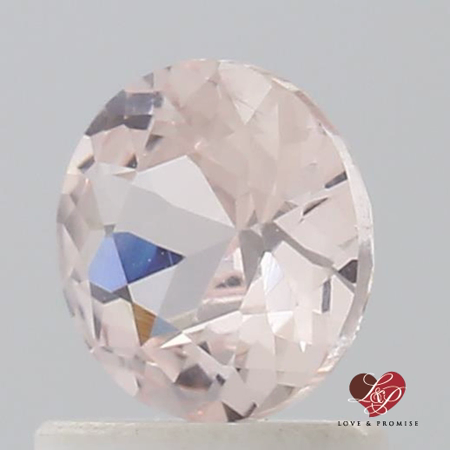 0.98cts Round Peachy Pink Champagne Sapphire