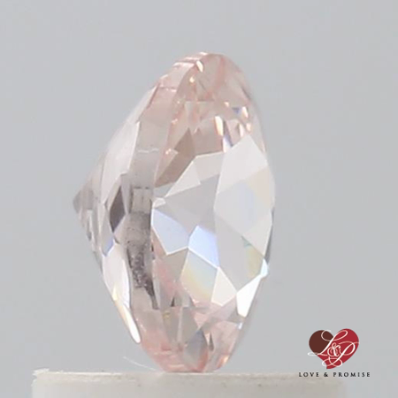 0.98cts Round Peachy Pink Champagne Sapphire