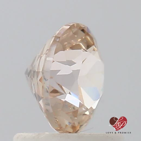 1.08cts Round Peachy Pink Champagne Sapphire