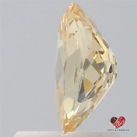 1.13cts Oval Peachy Champagne Sapphire