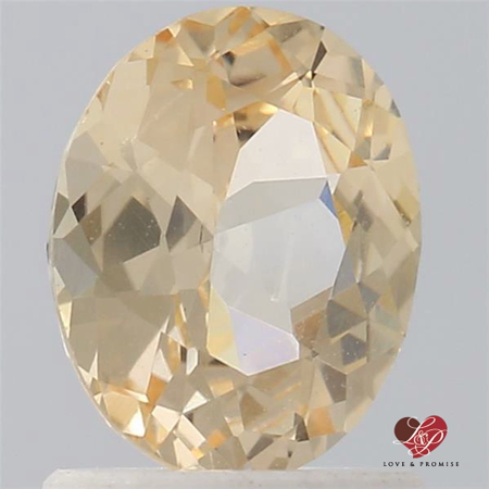1.13cts Oval Peachy Champagne Sapphire