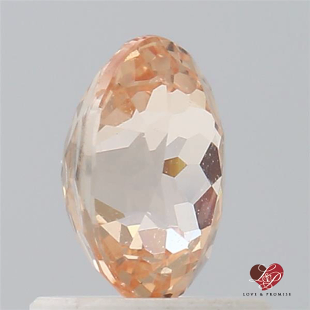1.14cts Oval Peachy Pink Champagne Melon Sapphire 