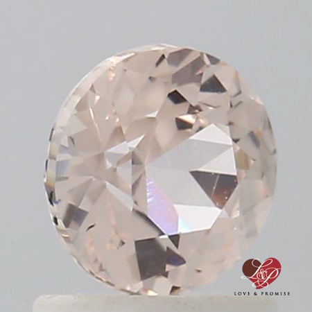 1.18cts Round Peachy Pink Champagne Sapphire