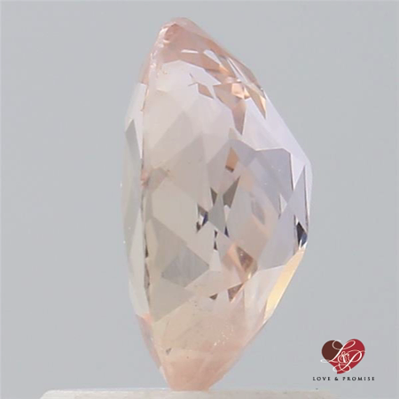 1.30cts Oval Peachy Pink Champagne Sapphire 