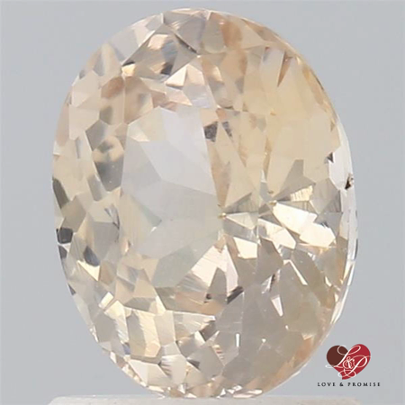 1.42cts Oval Peach Champagne Sapphire