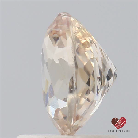 1.47cts Oval Peachy Pink Champagne Sapphire