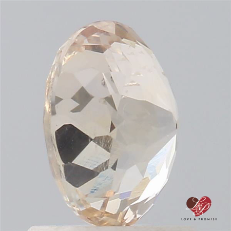 1.47cts Oval Peachy Pink Champagne Sapphire