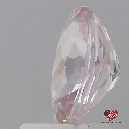 1.61cts Oval Light Peachy Blush Champagne Sapphire 