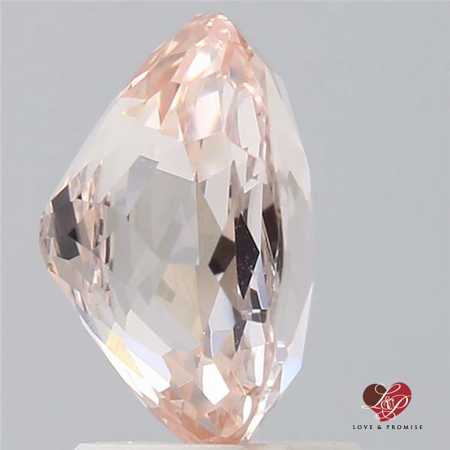 2.62cts Oval Peachy Pink Champagne Sapphire