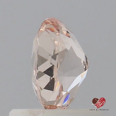 0.80cts Oval Peachy Pink Sapphire