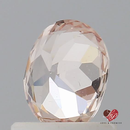 0.80cts Oval Peachy Pink Sapphire