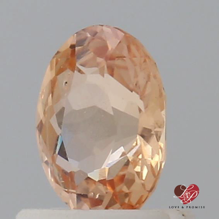 0.83cts Oval Peachy Pink Apricot Sapphire