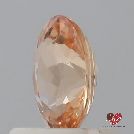 0.83cts Oval Peachy Pink Apricot Sapphire