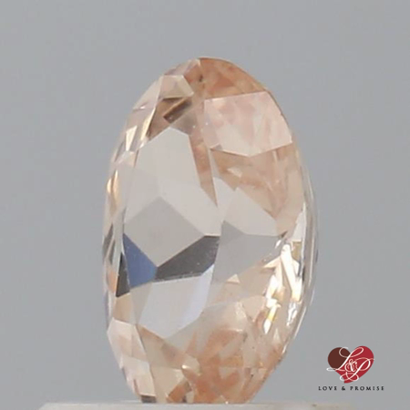 0.93cts Oval Peachy Pink Champagne Sapphire
